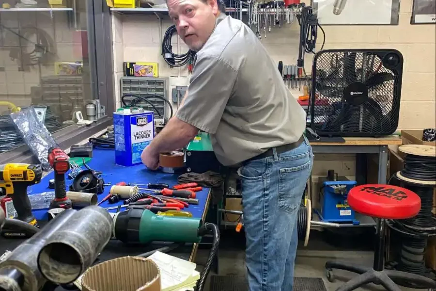 Matt Barlow repairing BAK machines