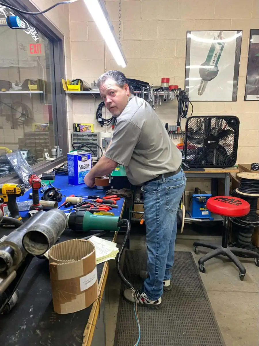 Matt Barlow repairing BAK machines